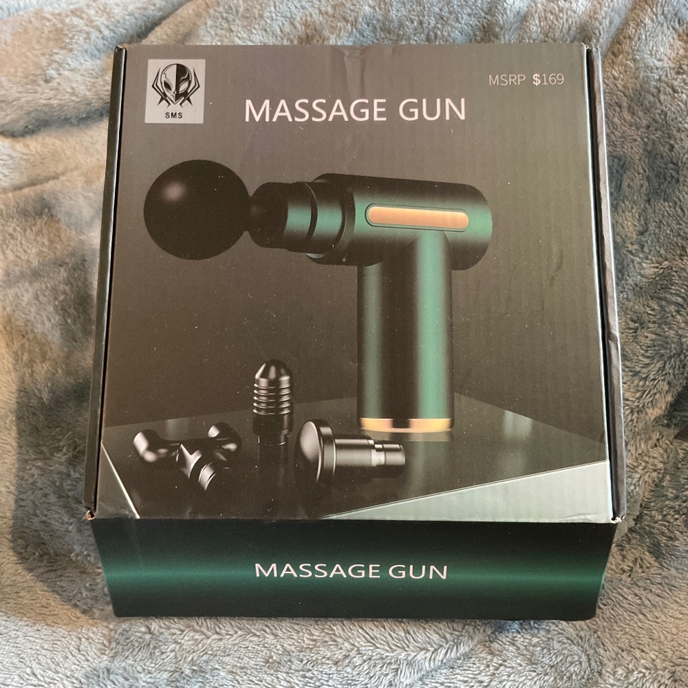 NWT Unopened box Massage Gun
